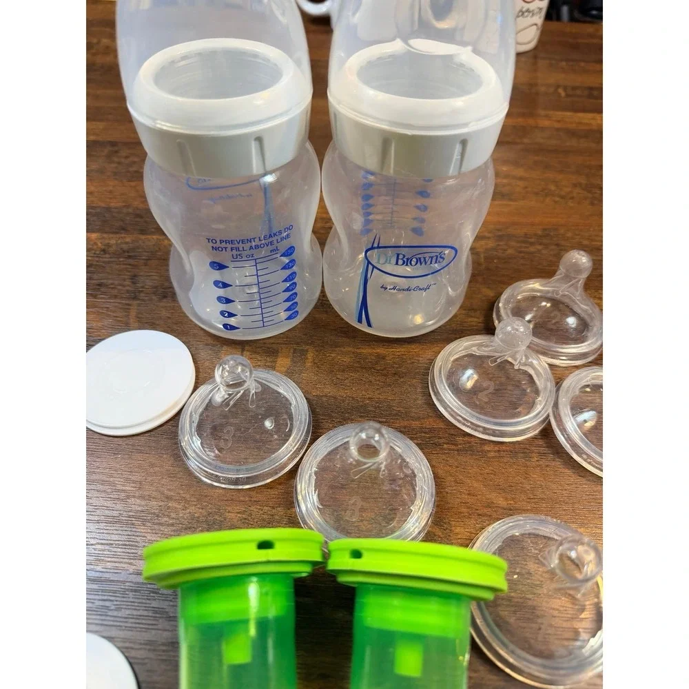 Dr. Browns 5 ounce anti colic wide neck baby bottle lot w/ various nipple flows
